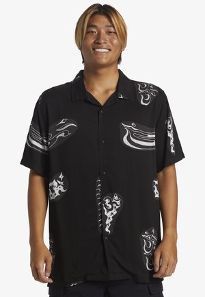 Black short-sleeve shirt featuring various white graphic patterns, button-down design, and relaxed fit. Made from a lightweight fabric.