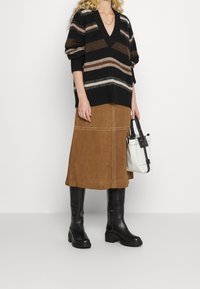 MUNTHE Strickpullover - black