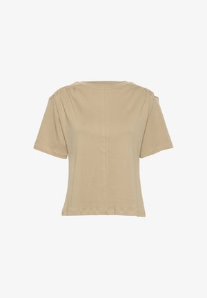 Bežinė trumpa rankovė marškinėlių su apvalia iškirpte, šiek tiek puffed pečiais ir lygiu tekstūru su matomais siūlių detalėmis.