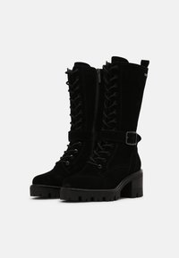 Tamaris Stivaletti con plateau - black