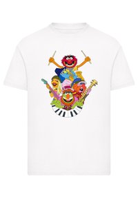 Weißes Baumwoll-T-Shirt mit bunten Muppet-Charakteren. Das Design beinhaltet Musikinstrumente und ein Klaviertastenmuster am unteren Rand.