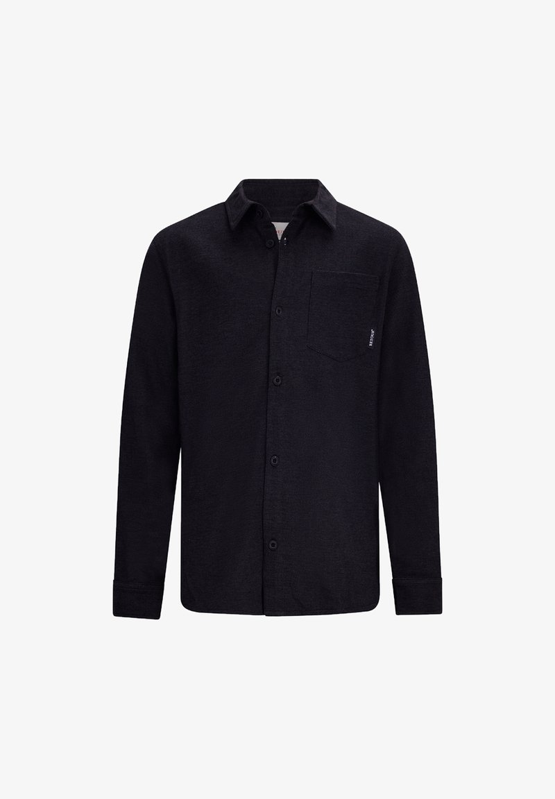 Chemise noire à boutons avec manches longues, col, poche avant, en tissu texturé. Dispose d'un détail de logo subtil sur la poche.