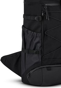 Black backpack featuring multiple compartments, side mesh pocket, adjustable straps, and a durable, textured fabric with minimalistic design.