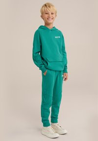 WE Fashion SALTY DOG - Treniņtērpa apakšdaļas - green