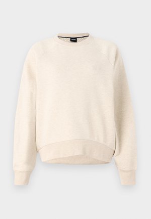 Jasno beżowy sweatshirt z okrągłym dekoltem, ściągaczami przy mankietach i u dołu, oraz małym logo na piersi. Miękka tekstura i luźny krój.