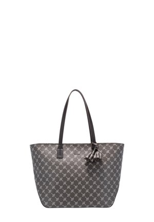 Sac fourre-tout gris foncé avec un motif répétitif de feuilles blanches, deux bandoulières et trois pendentifs en cuir en forme de gland attachés près du haut.