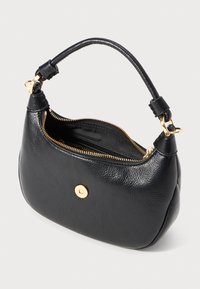 Black textured leather shoulder bag with gold zipper partially open, curved handle, and circular gold decorative clasp on front.