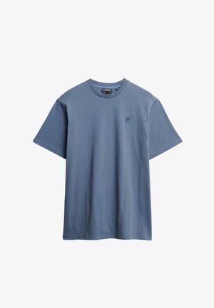 Bomulds T-shirt i blød blå, klassisk rund hals, løs pasform, korte ærmer, med et lille, broderet logo på brystet.