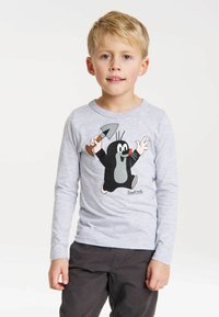 Long-sleeve gray shirt featuring a cartoon mole holding a spade. Soft cotton material with a printed design and round neckline.