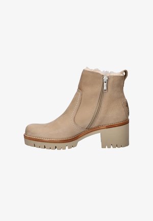 Beige Lederanze ankle boots mit seitlichen Reißverschlüssen, einem weichen Innenfutter und einem klobigen, beigen Gummihacken mit gezahnter Kante.