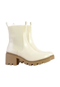 Divine Factory Bottines à plateau - beige