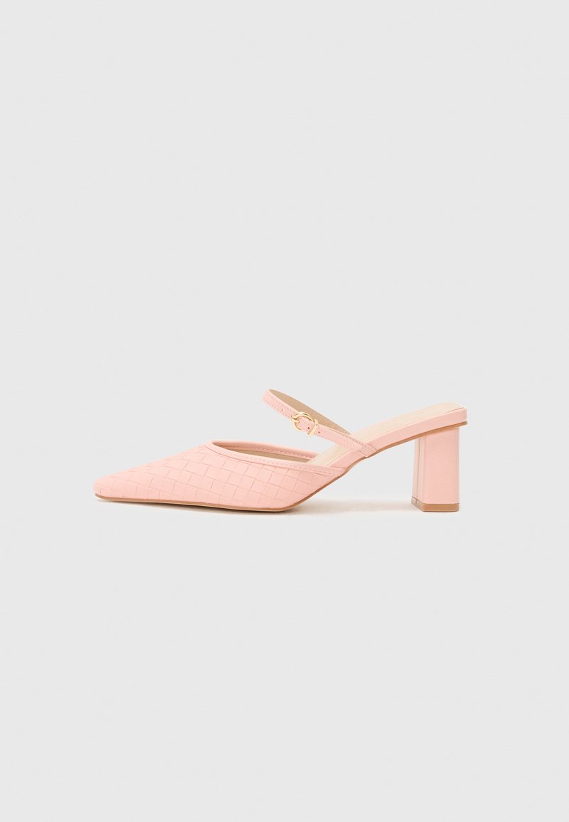 Pink, pointed-toe heeled mules with a woven texture and a thin ankle strap. Features a block heel and a smooth insole.