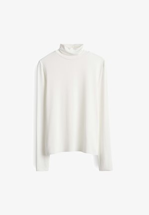 Witte coltrui met lange mouwen, gemaakt van zachte, soepele stof met een relaxte pasvorm en minimale naden, ideaal voor het leggen van lagen.