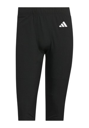 Leggings de sport noirs fabriqués dans un matériau lisse et extensible, avec un logo Adidas blanc sur le côté gauche et une taille élastique.