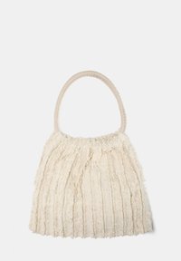 Cream faux fur handbag with a textured, striped design and a soft, plush exterior. Features a rounded fabric handle.