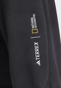 Adidas Terrex NATIONAL GEOGRAPHIC AERO.READY_WARMING PANTS - Āra bikses - black