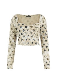 Top recortado hecho de tela estampada en beige con puntos negros y grises. Presenta un escote cuadrado y mangas largas.