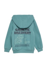 Turkusowy, zasuwany sweatshirt z kapturem, z graficznym nadrukiem przedstawiającym niskopoligonowego dinozaura oraz tekstem o eksploracji kosmosu na plecach. Tekst w ciemnoniebieskim kolorze.