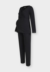 Μαύρο σύνολο άνετης εγκυμονούσας ένδυσης που περιλαμβάνει τοπ με δέσιμο και δαντέλα στο τελείωμα και μακριά μανίκια, συνδυασμένο με παντελόνια στο ίδιο σχέδιο, σχεδιασμένο για άνεση.