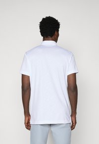 J.LINDEBERG Sports PEAT - Polo krekls - white
