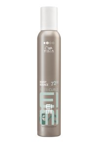Wella Professionals Nutricurls mousse i en silverfärgad cylindrisk burk med ett vitt lock. Har turkosa texter och en våglogotyp.