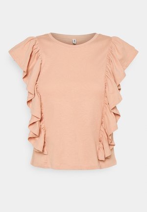 Jasnoróżowa koszula z krótkim rękawem, z falbankami wzdłuż boków sięgającymi rękawów, okrągły dekolt, gładki materiał.