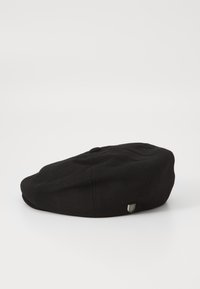 Black wool beret with a rounded shape, flat crown, and a decorative metallic accent on the side. Smooth texture and classic design.