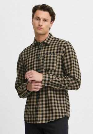 Geklede flanellen overhemd in bruin en zwart, met een button-down kraag, een voorzak en blauwe knopen. Lange mouwen met knoopmanchetten.