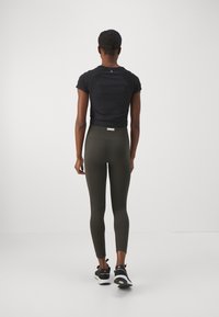 Björn Borg STUDIO SEAMLESS - Tights - peat