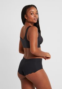 Sloggi ZERO-FEEL BRALETTE - Toppe - black