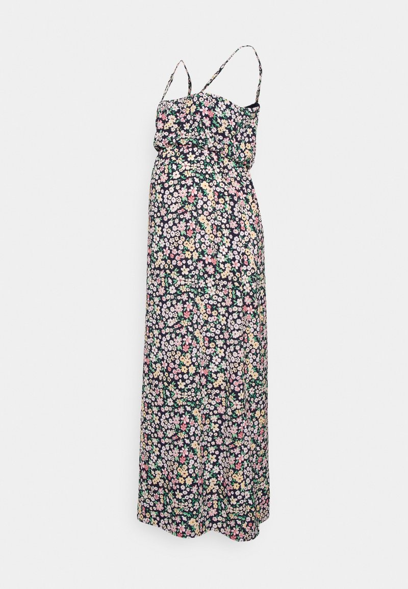 Robe maxi noire avec fines bretelles et petit motif floral coloré en rose, jaune, blanc et vert.