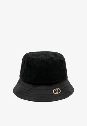 Black bucket hat featuring a textured knit upper, smooth quilted lower band, and a gold logo accent on the front.
