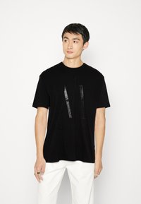 Armani Exchange T-shirts med print - black