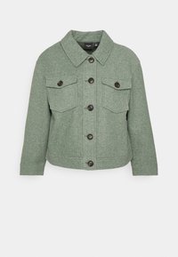 Green, textured jacket with a collared neckline, front pockets, and black button closures; features a boxy shape and long sleeves.