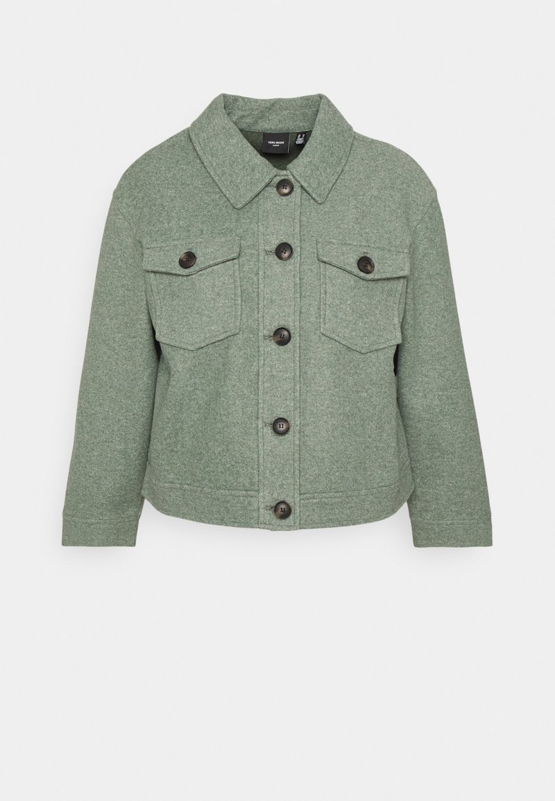Green, textured jacket with a collared neckline, front pockets, and black button closures; features a boxy shape and long sleeves.