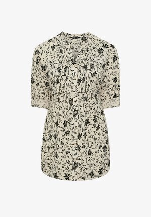 Cremfarbige Bluse mit schwarzem Blumenmuster, kurzen Ärmeln, durchgehender Knopfleiste und einer gefältelten Detail nahe dem Kragen.