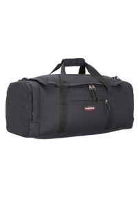 Black duffle bag made of durable fabric, featuring dual top handles, a zip closure, and a front pocket with smooth zippers.