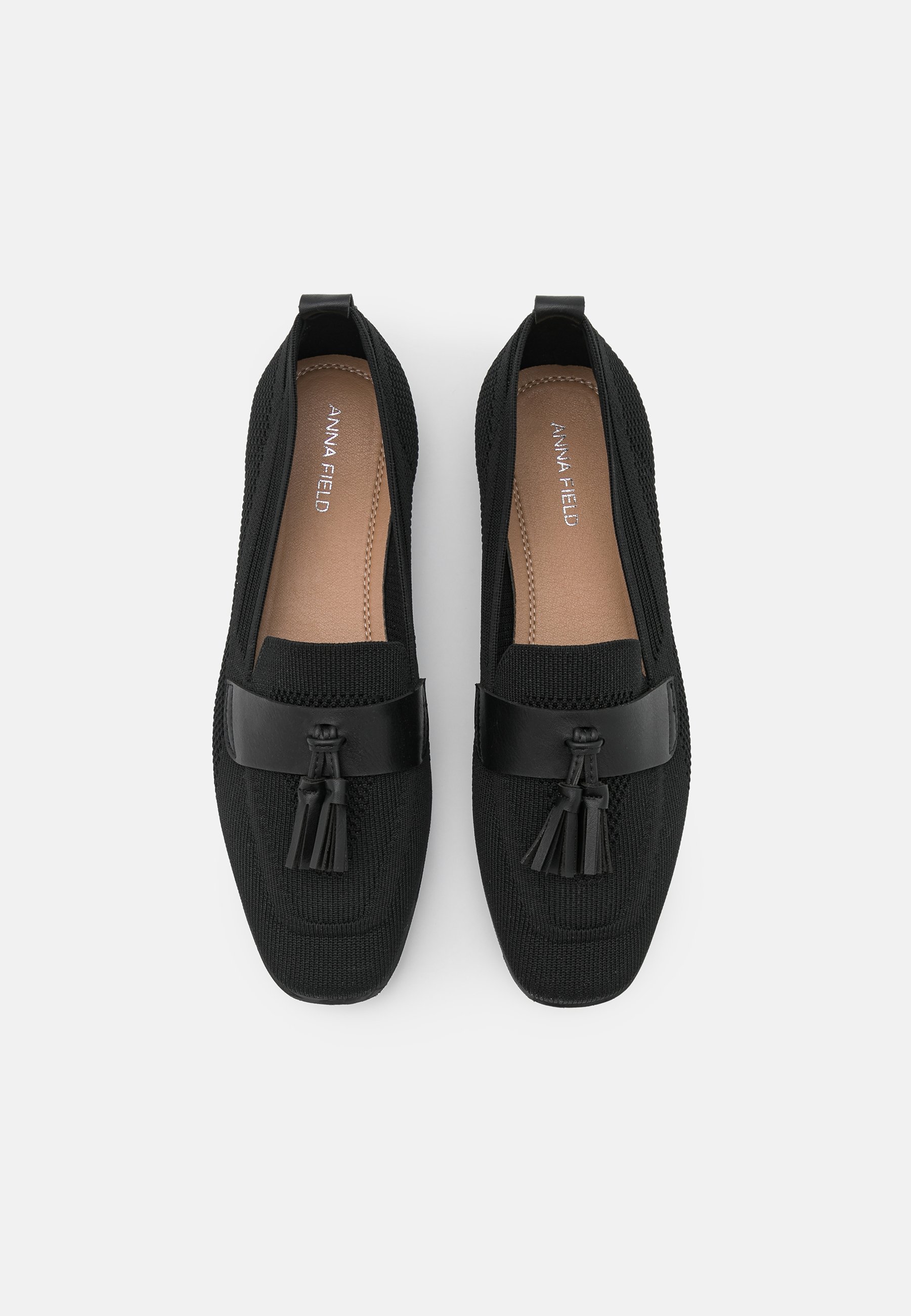 black flat slip ons
