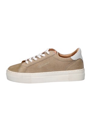 Beige suede low-top sneaker with white laces, thick white rubber sole, and white textured heel tab detail.