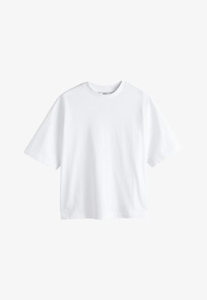 Valkoinen ylisuuri t-paita, jossa lyhyet hihat ja pyöreä pääntie, yksivärinen, esitetty valkoisella taustalla.