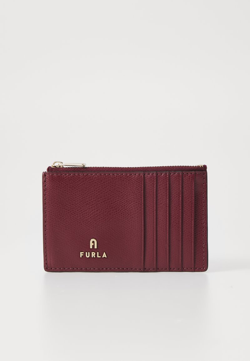 Burgundy leather cardholder with textured finish, gold logo, and six card slots. Features a zippered compartment for secure storage.