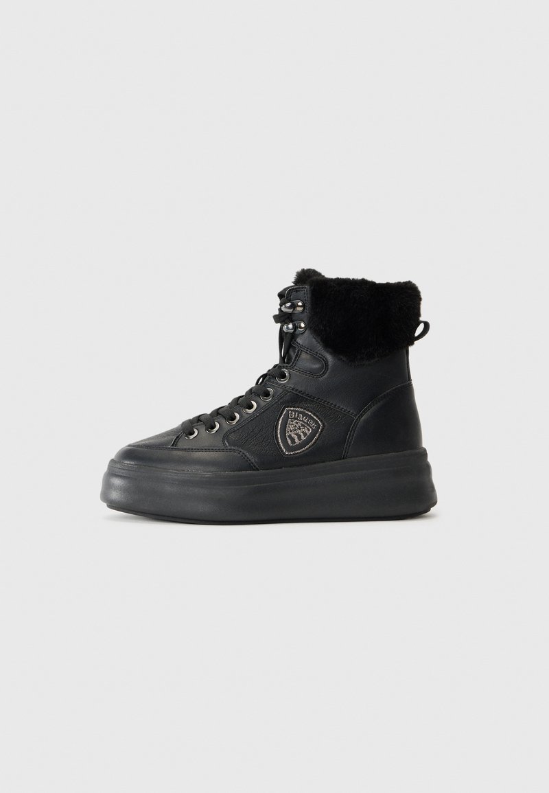 Black high-top sneakers with a fur lining, leather material, rounded toe, and flat rubber sole. Features metal eyelets and a logo patch.