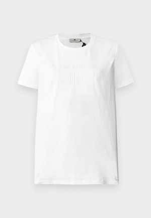 T-shirt en coton blanc à manches courtes et col rond. Présente un logo en relief et un design de texte sur le devant, texture lisse.