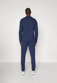 Lacoste Sport TENNIS PANT - Spodnji deli trenirk - navy blue