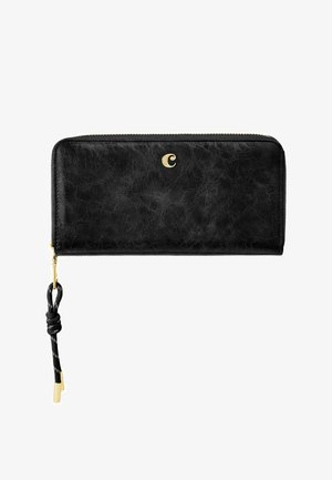 Portefeuille zippé en cuir noir texturé avec une fermeture éclair dorée, un petit logo "C" doré, et une tirette de fermeture éclair en cordon noir avec embouts dorés.