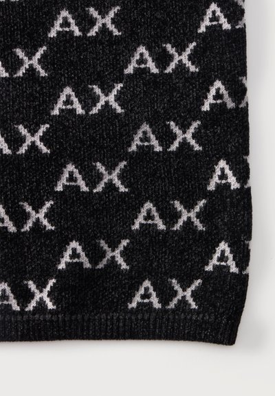 Черна плетена тъкан с повтарящ се бял "AX" буквен мотив и ръб с рипс в долната част.