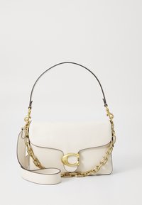 White leather handbag with a gold-tone clasp, a chain strap, and a detachable shoulder strap; features curved lines and contrast stitching.