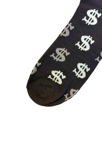 Mustat sukat, joissa on toistuva valkoinen dollarimerkkikuvio, sileä pinta ja pyöristetty kärki.