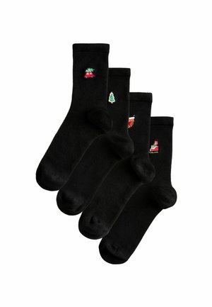 Black socks with colorful embroidered designs: red car, green Christmas tree, red stocking, and a Santa in a sleigh. Soft fabric, crew length.