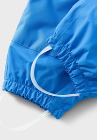Blue waterproof fabric with a smooth texture, featuring elasticized cuffs and clear plastic drawstrings. Soft and lightweight design.